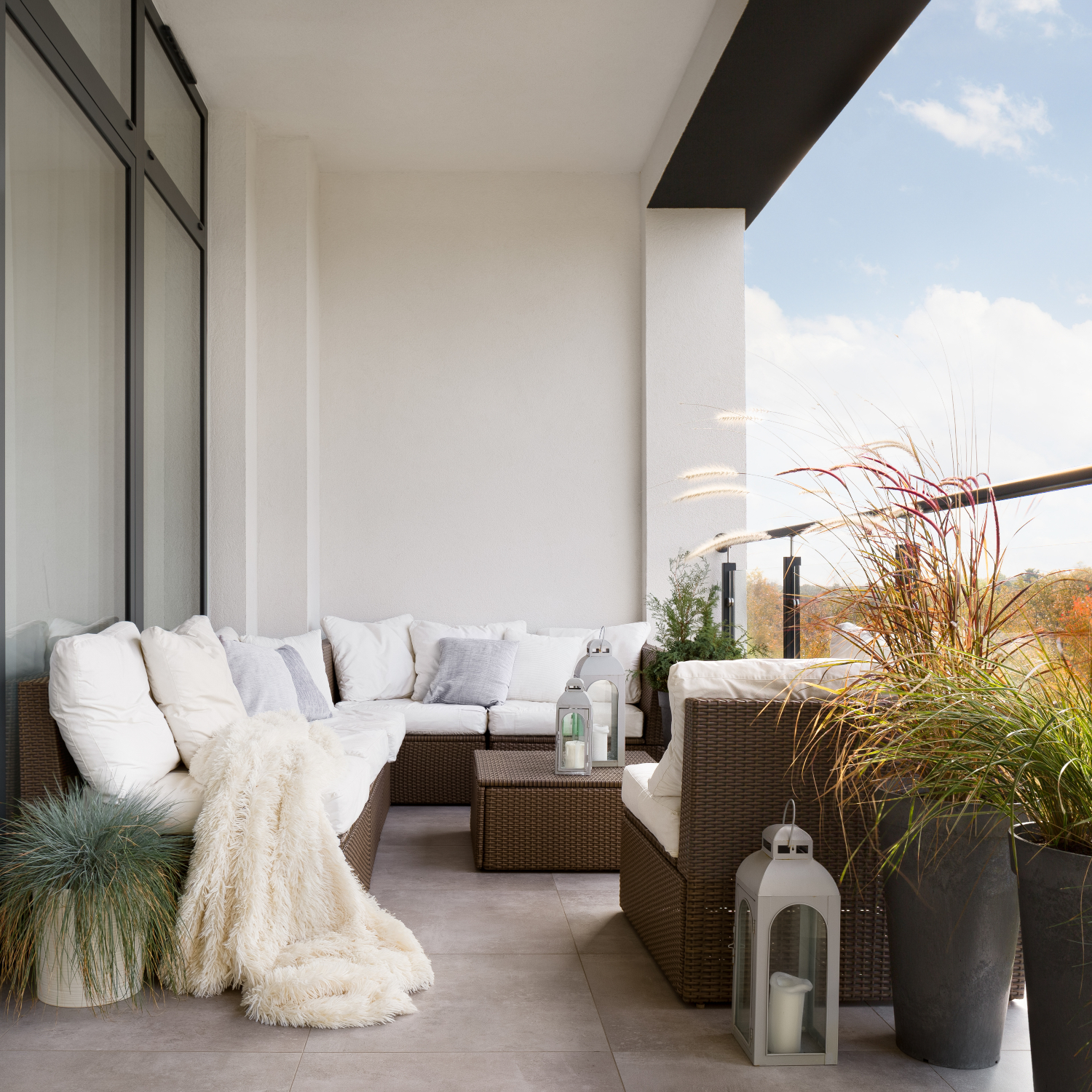 Outdoor balcony with furniture and plants